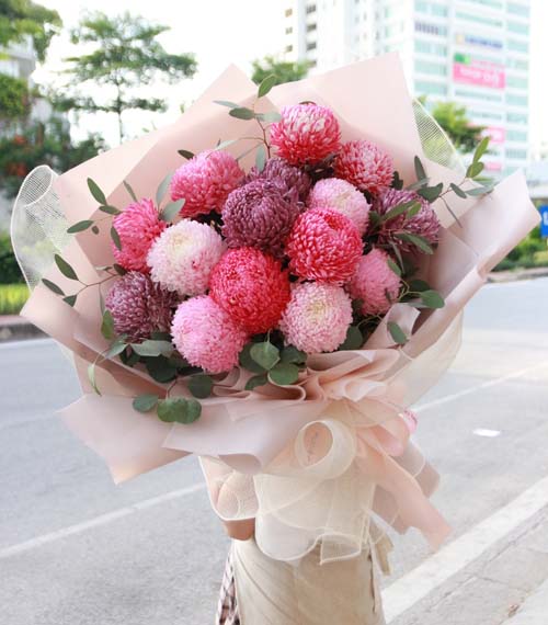 Bouquet of pink chrysanthemum peonies mixed with many colors