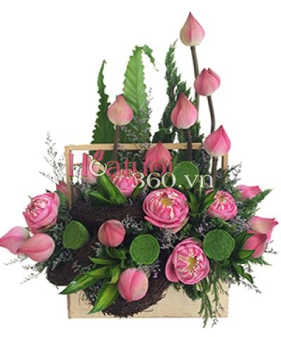 A basket of lotus flowers with Vietnamese beauty