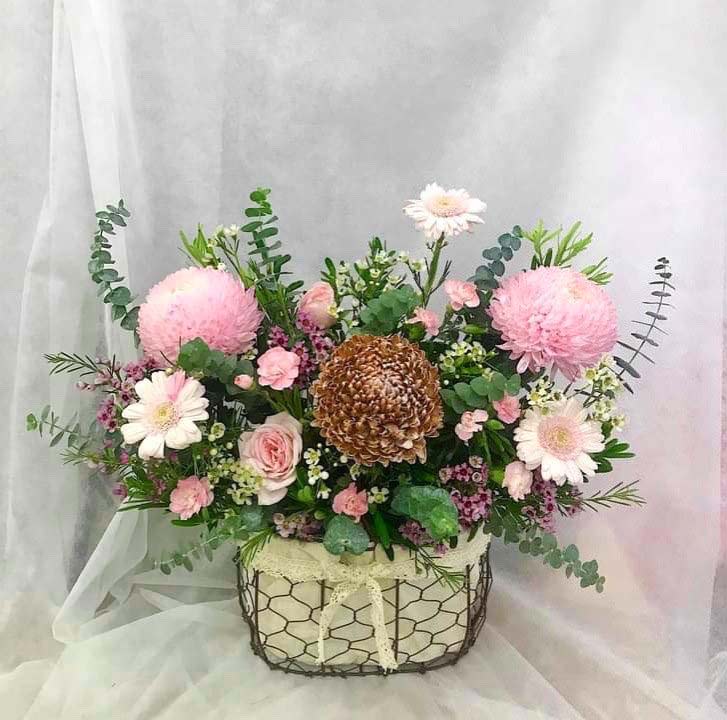 Peonies combined with many other flowers